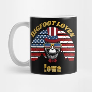 Bigfoot loves America and Iowa Mug